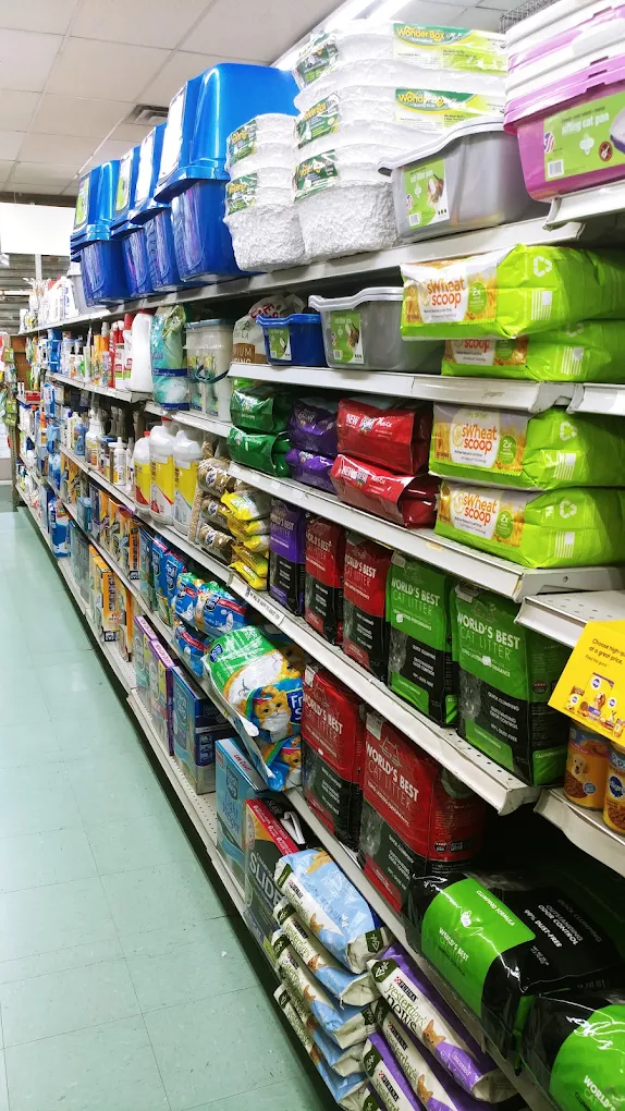 Shelves of litter and pet supplies inside All in 1 Pet Shop in Greenpoint